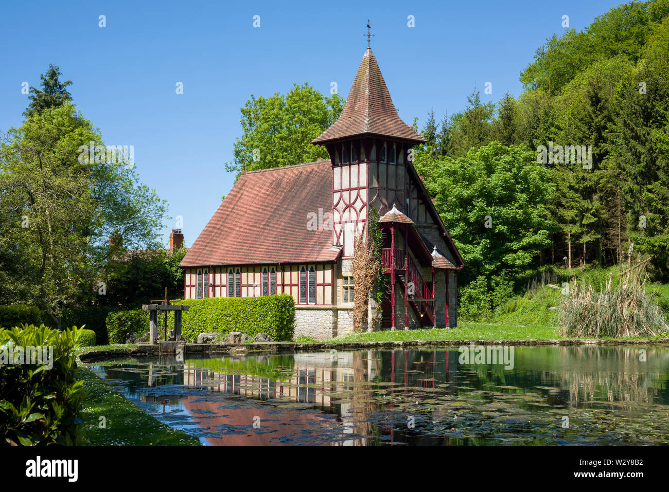 The Masonic Lodge and mill pond at Rickford in the Mendip Hills National Landscape near Blagdon, North Somerset, England. Stock Photo
