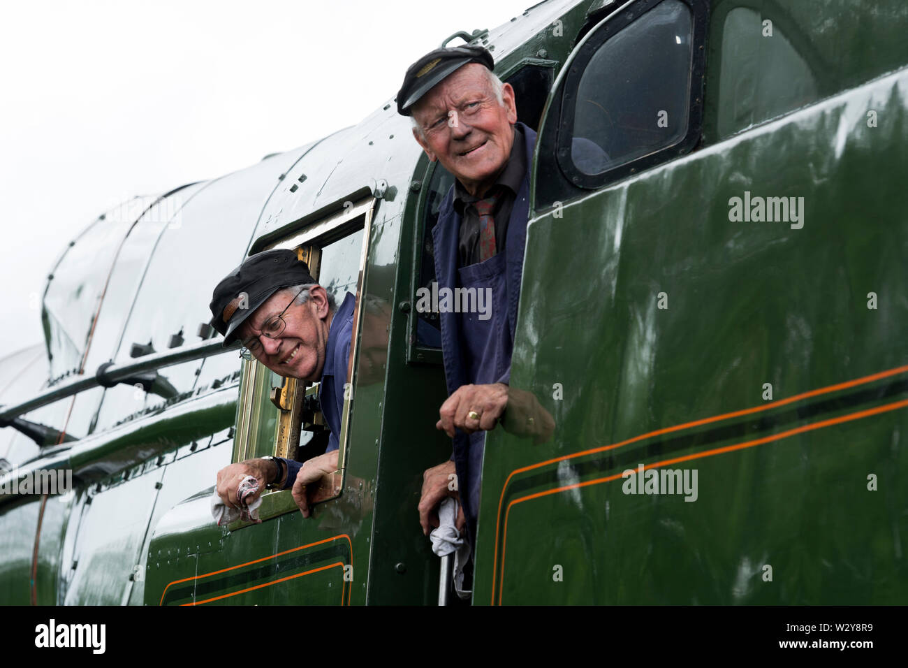 Train crew on Merchant Navy Class steam locomotive 'Clan Line' Stock Photo