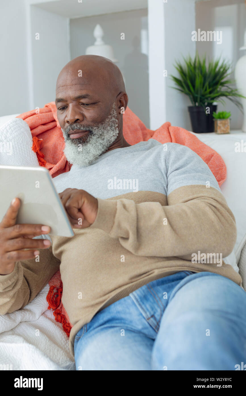 Man using digital tablet Stock Photo