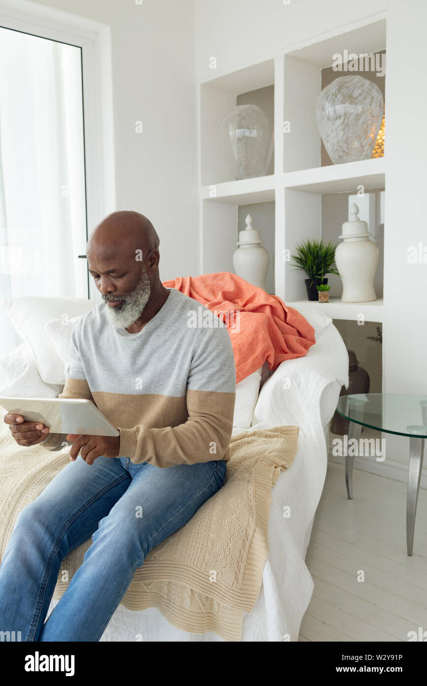 Man using digital tablet Stock Photo