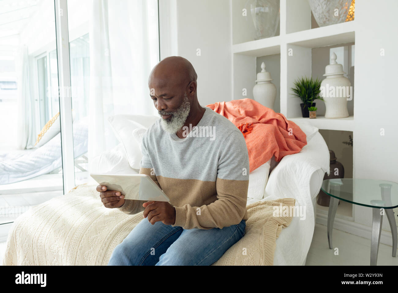 Man using digital tablet Stock Photo