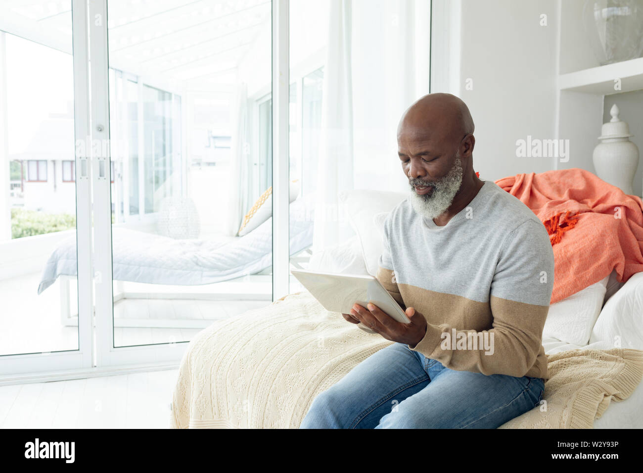 Man using digital tablet Stock Photo
