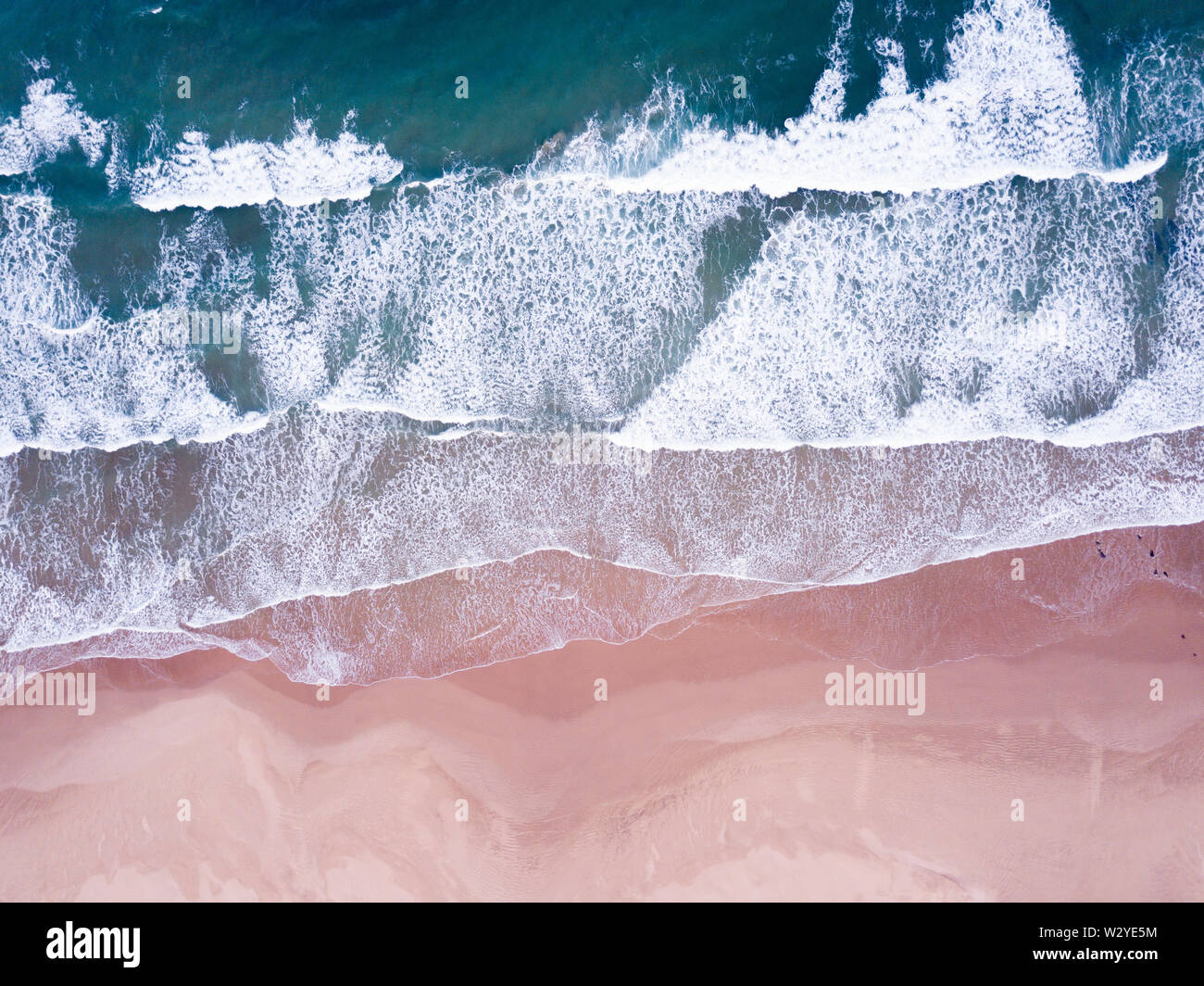 Aerial overhead waves and a beach Stock Photo