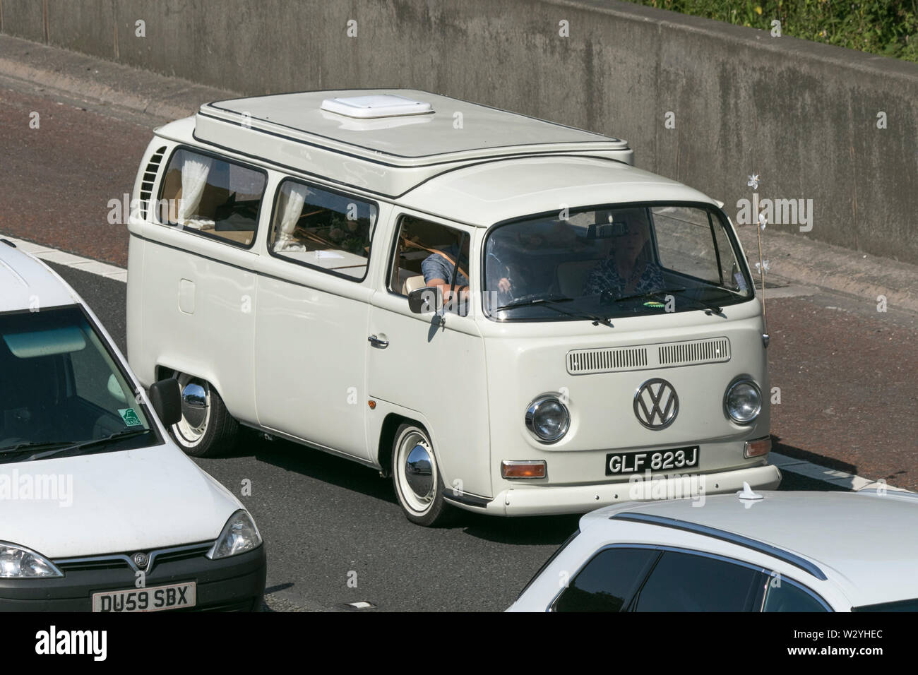 Vintage classic restored vehicles cars traveling on the M6 motorway to