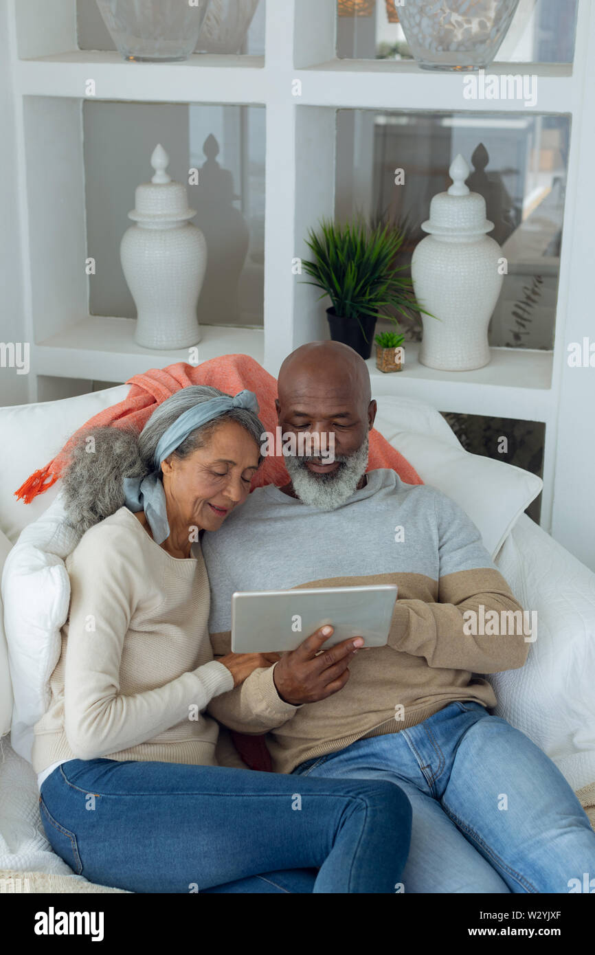 Couple using a digital tablet Stock Photo