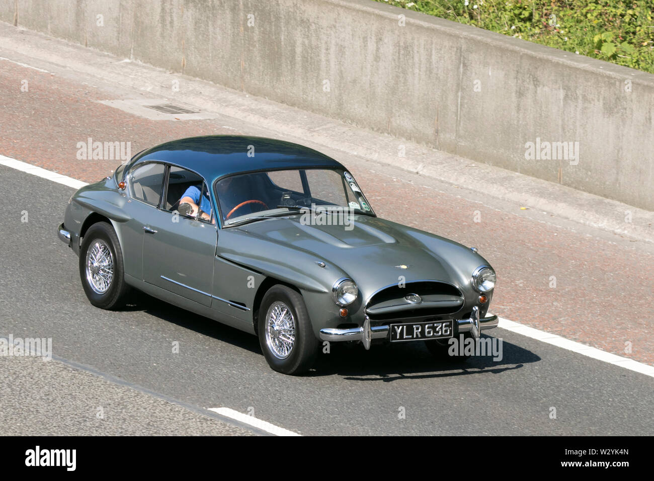 Vintage classic restored vehicles cars traveling on the M6 motorway to