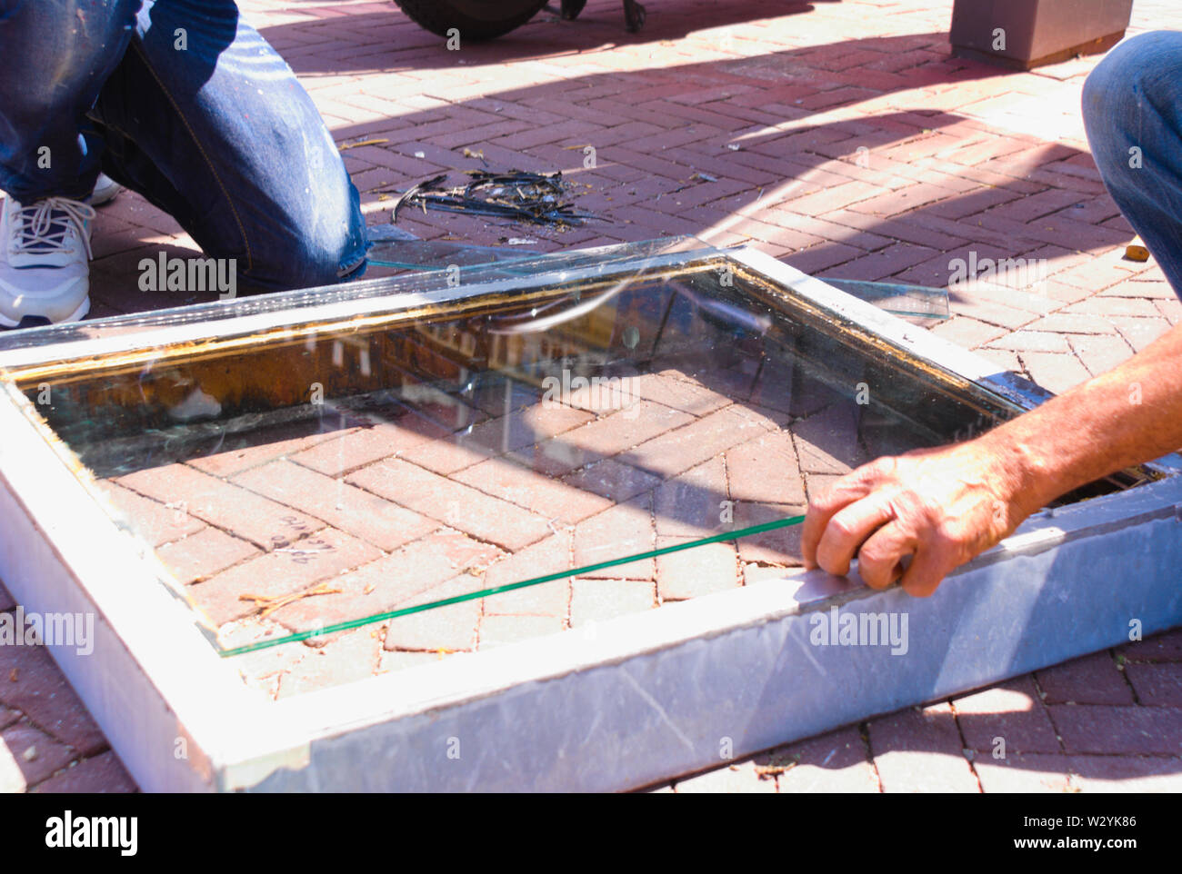 Window Maker At Work After A Code Oranje Storm Hit The City Of Amsterdam Stock Photo Alamy