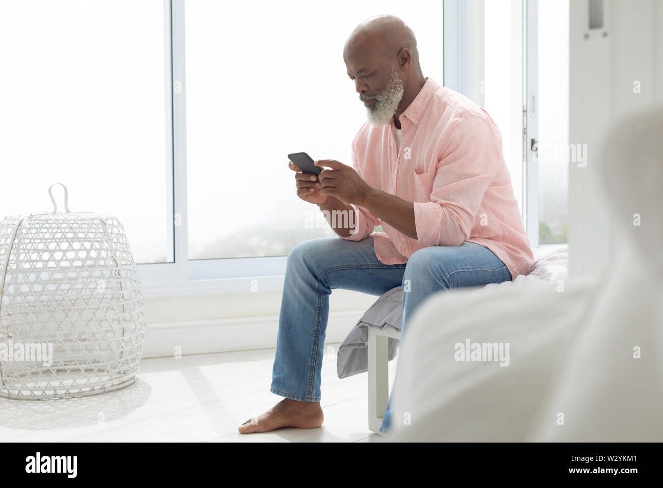 African american Man using smartphone Stock Photo
