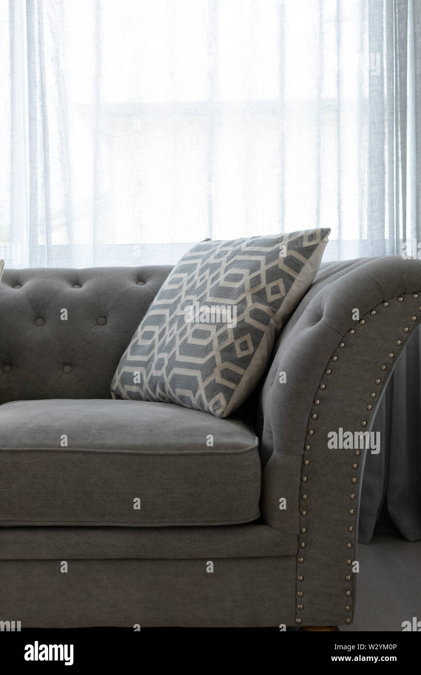 Grey couch hires stock photography and images Alamy