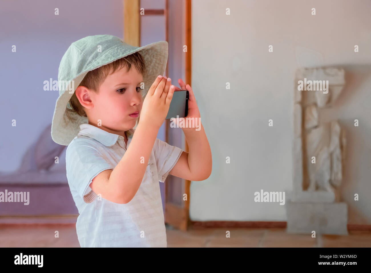 Media school concept. Education background. New approach to learning process. Young filmmaker. Modern museum concept. Young film director. Preschooler Stock Photo