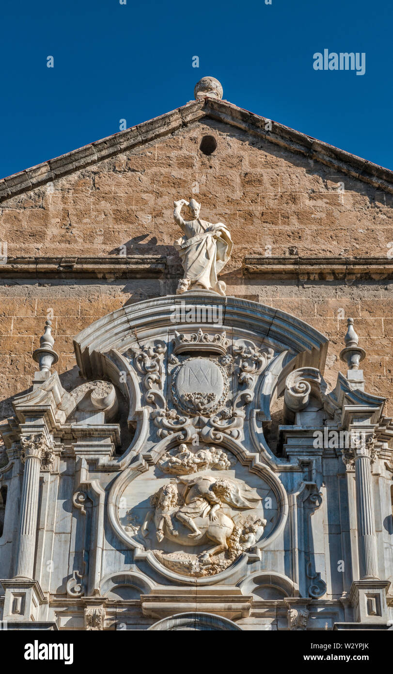 Marble reliefs, depicting San Pablo conversion and San Ignacio at Iglesia de Santos Justo y Pastor, 16th century church in Granada, Andalusia, Spain Stock Photo