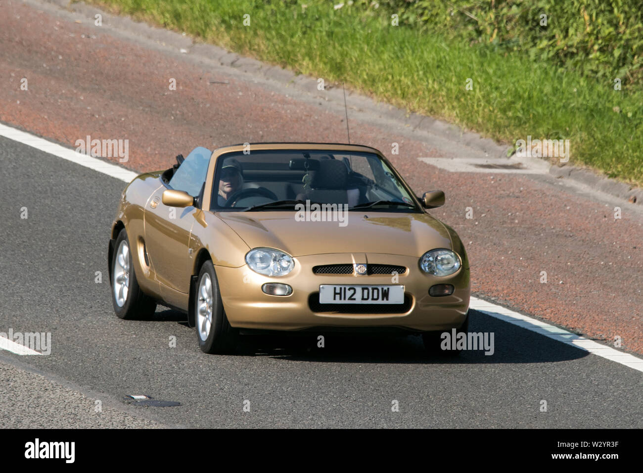 Vintage classic restored vehicles cars traveling on the M6 motorway to