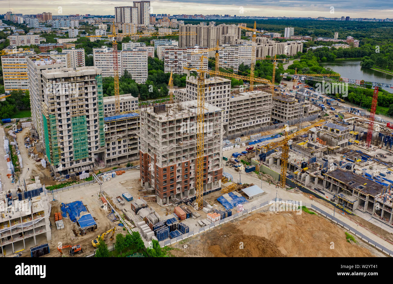 Photo inspiration: Luxury Condo Projects In Former Industrial Zone Reference: Cranes Working Day And Night On Construction Of The Housing
