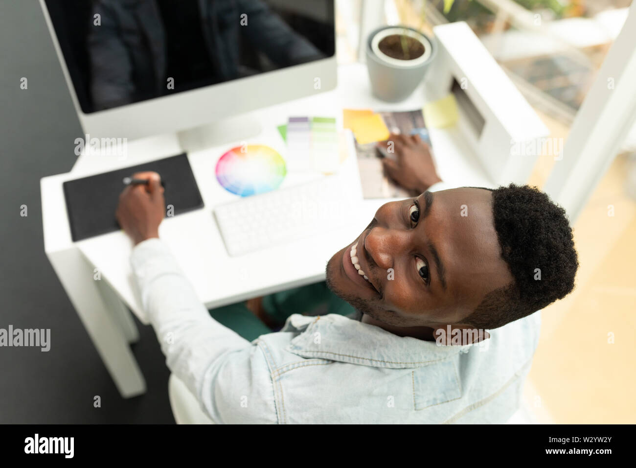Male graphic designer using graphic tablet Stock Photo