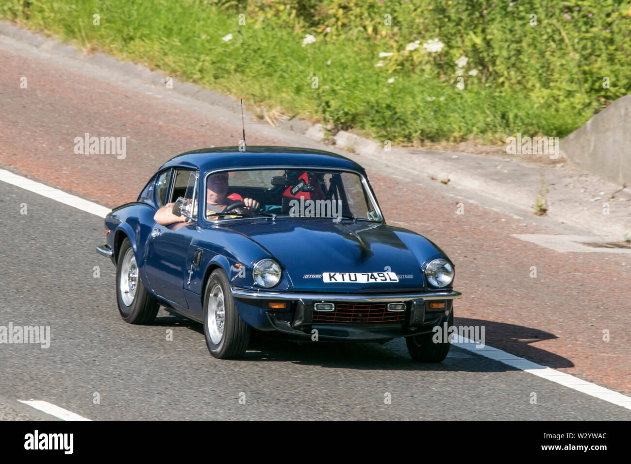 Triumph Toledo; Vintage classic restored vehicles cars traveling on the