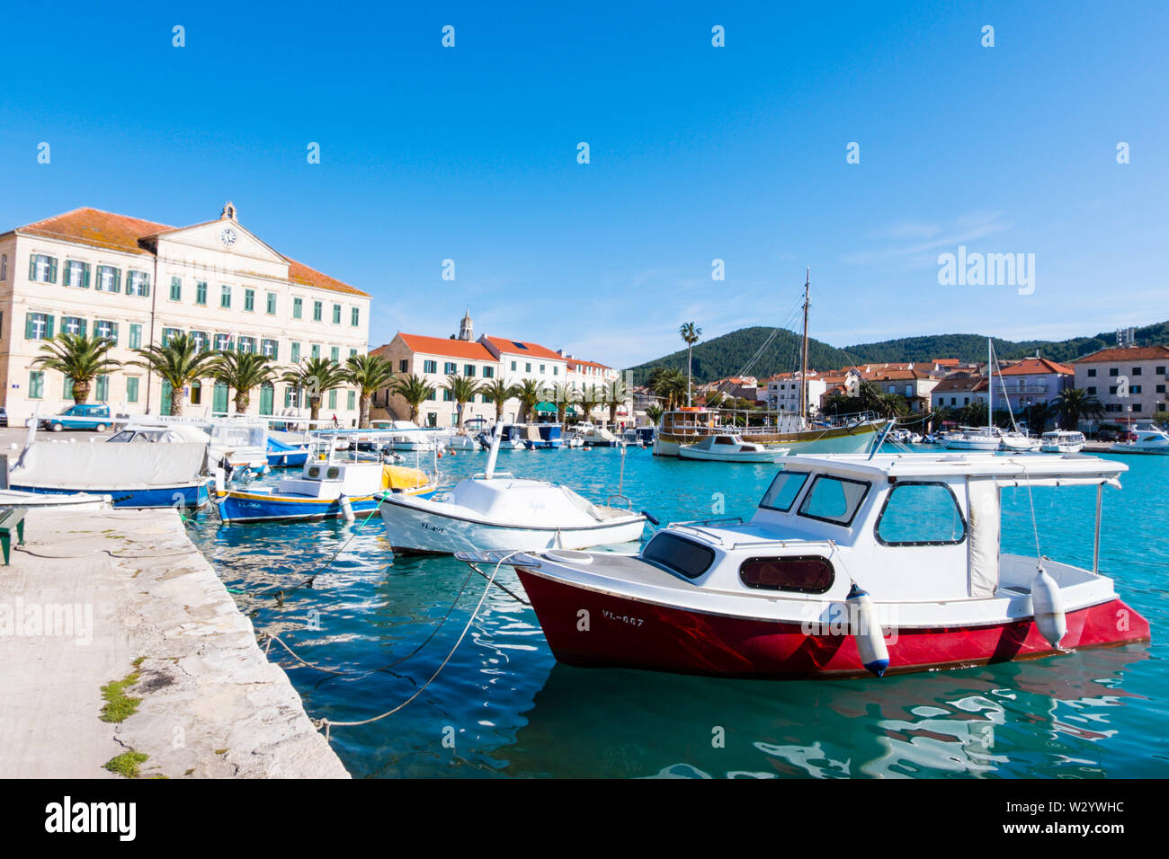 Boat piers, Obala 2, seaside street, Vela Luka, Korcula island, Dalmatia, Croatia Stock Photo