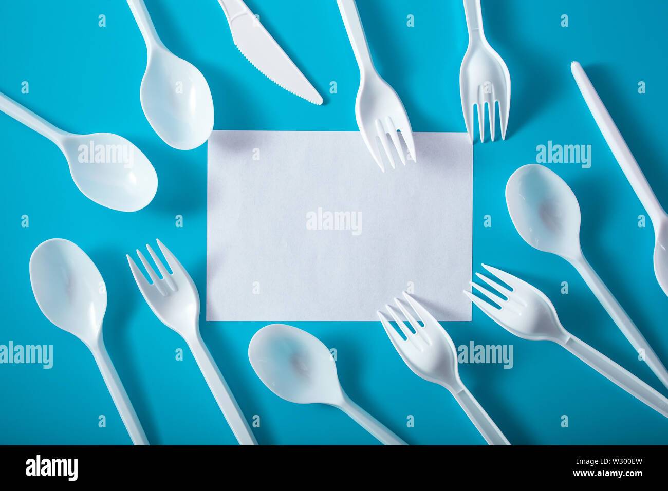 single use plastic forks, spoons. concept of recycling plastic, plastic