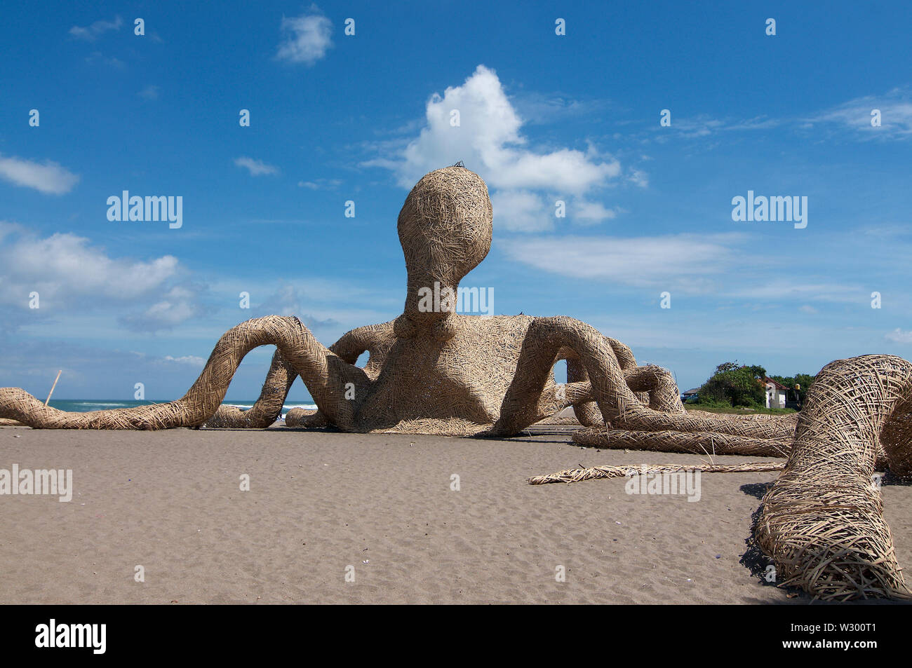 Picture of a giant Octopus installation made from Bamboo wood, located at the famous Berawa Beach in Canggu, Bali - Indonesia Stock Photo
