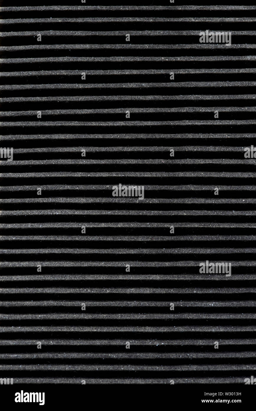 Close up of a blackened air filter for a car. Stock Photo