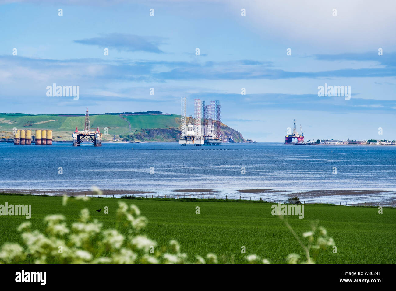 Disused and redundant North Sea oil riggs / drilling platforms stored offshore in Cromarty Firth. Cromarty Black Isle Highland Scotland UK Britain Stock Photo