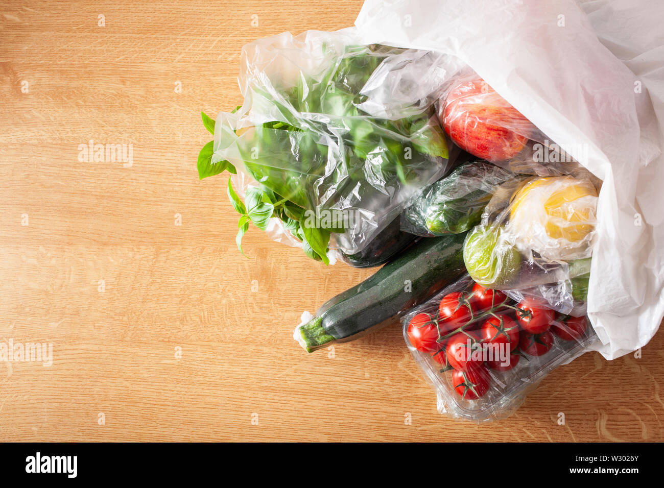 single use plastic packaging issue. fruits and vegetables in plastic