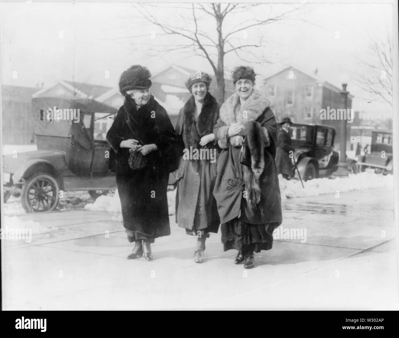 On street in fashionable winter attire Stock Photo Alamy