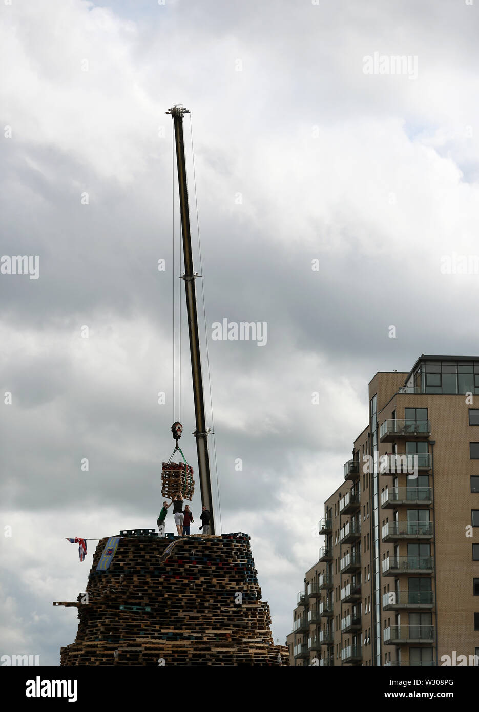 Bonfire builders in the Sandy Row area of Belfast as building continues ...