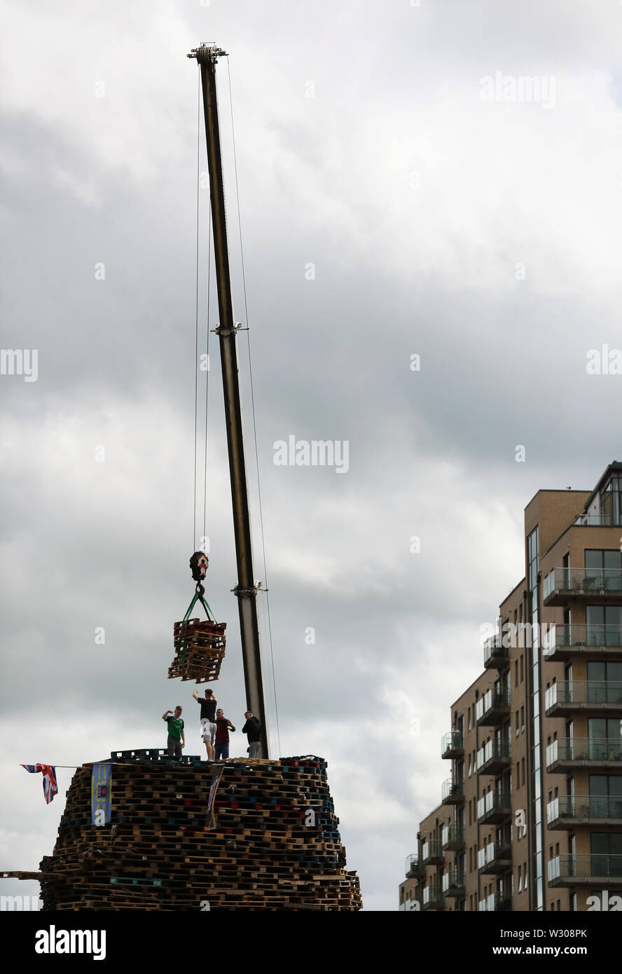 Bonfire builders in the Sandy Row area of Belfast as building continues ...