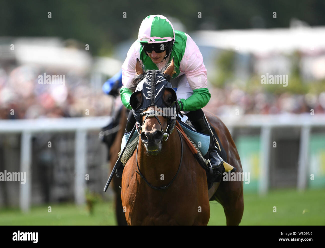 Duke Of Hazzard ridden by jockey P J McDonald coming home to win the Edmondson Hall Solicitors Sir Henry Cecil Stakes during day one of the Moet and Chandon July Festival 2019 at Newmarket Racecourse. Stock Photo