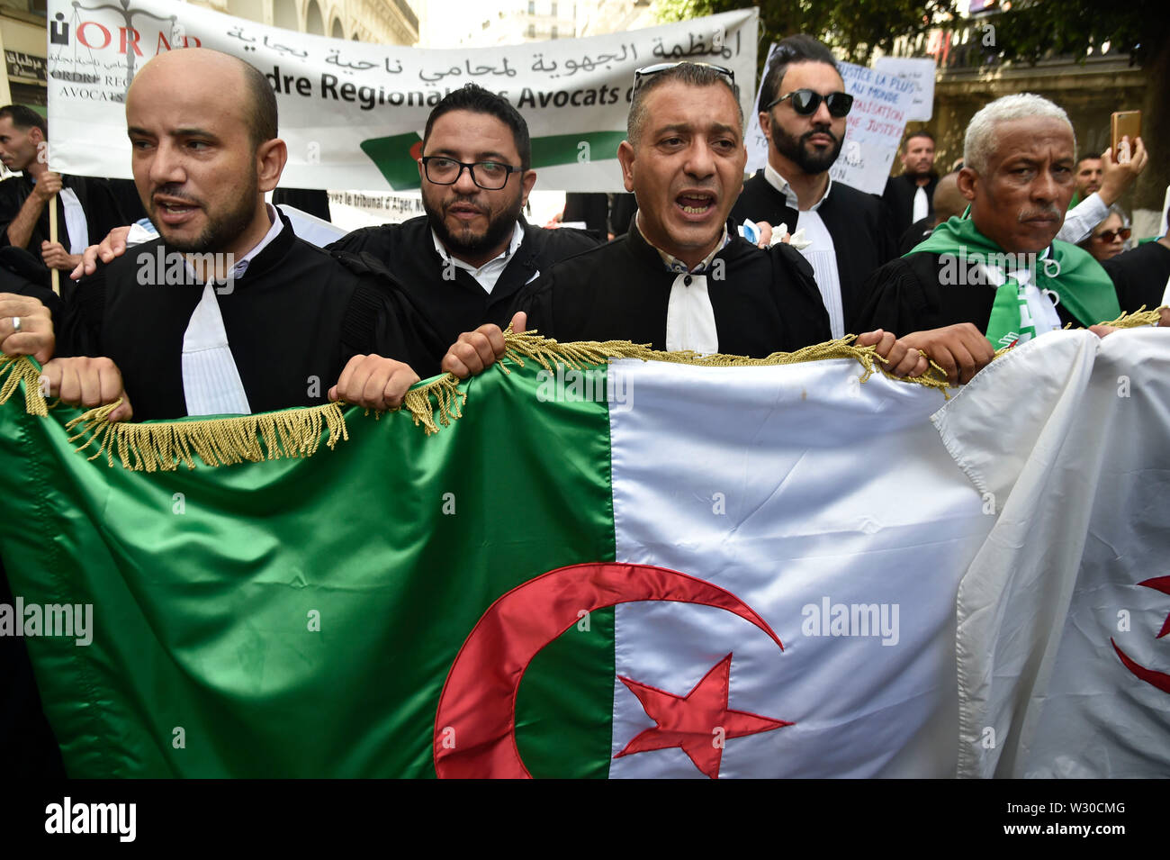 Algiers. 11th July, 2019. Algerian lawyers march in Algiers, captial of Algeria on July 11, 2019, demanding reforms to ensure the freedom of their works and legal justice. Credit: Xinhua/Alamy Live News Stock Photo