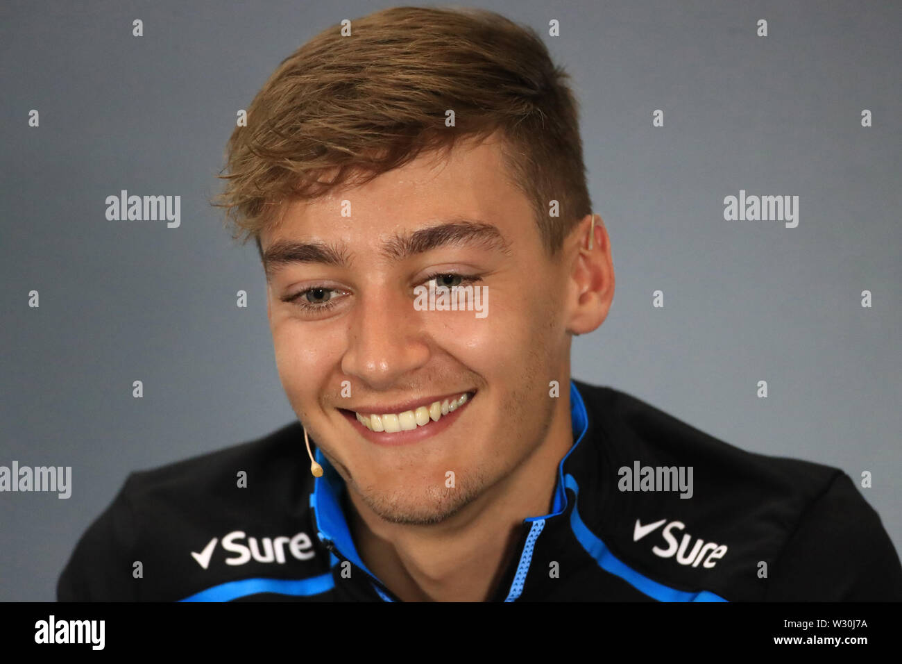Silverstone, Northampton, UK. 11th July 2019. F1 Grand Prix of Great Britain, Driver arrivals day; ROKiT Williams Racing, George Russell during driver press conference Credit: Action Plus Sports Images/Alamy Live News Stock Photo
