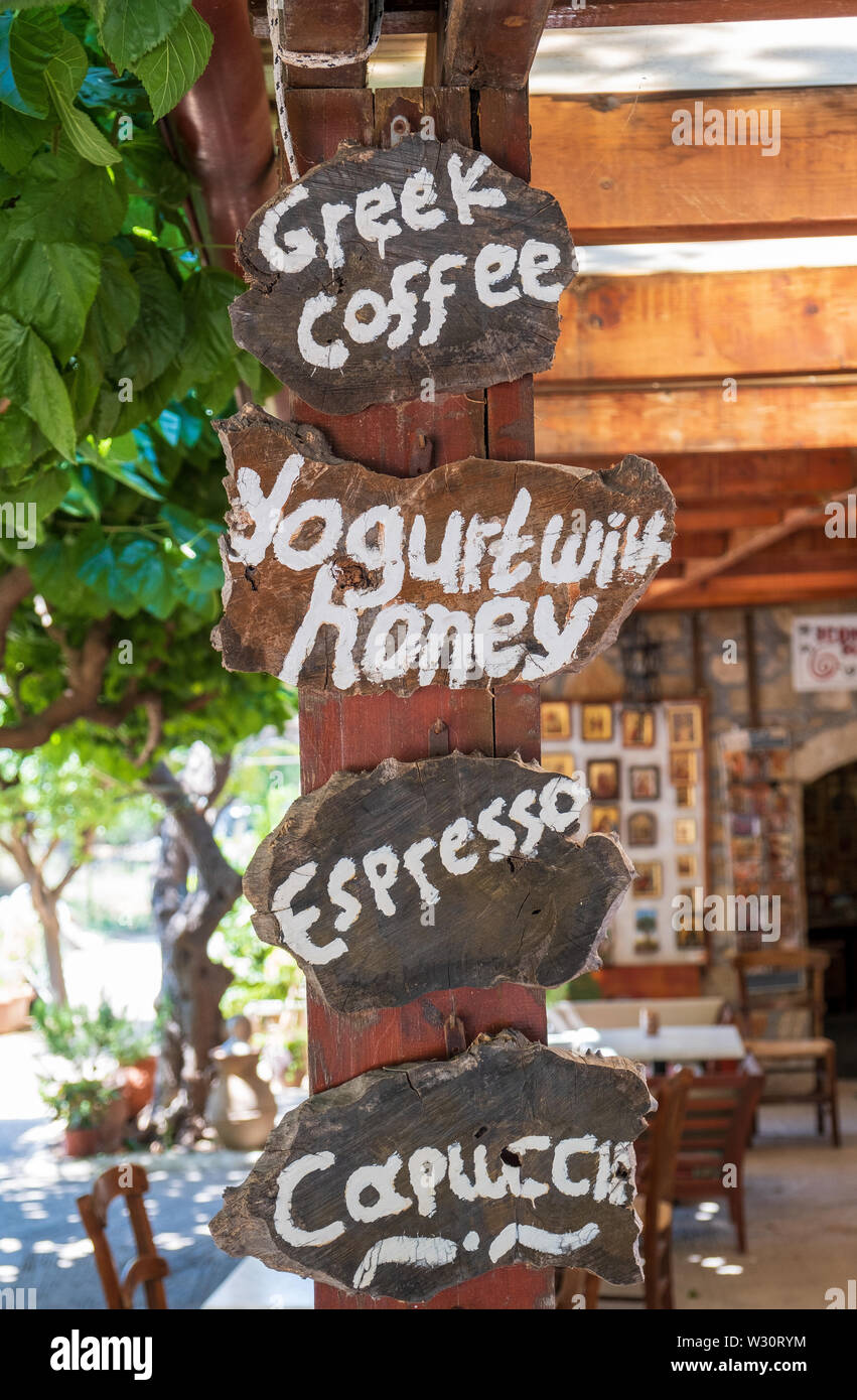 Menu board outside Greek cafe, Crete Stock Photo Alamy