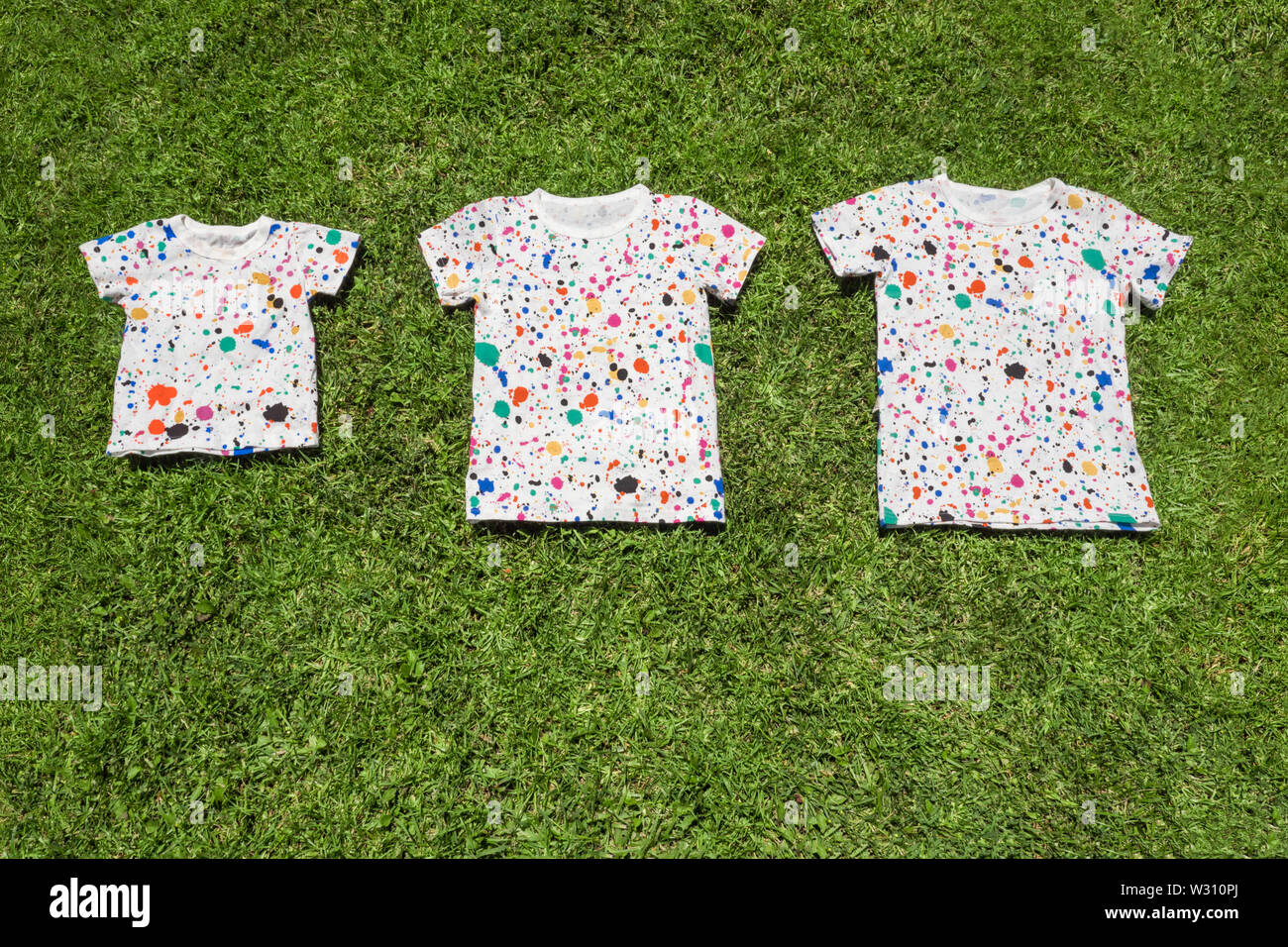 Similarity and variety background. lothes for children. Adventure camp concept. Nursery school background. Children of different ages. Growing up Stock Photo