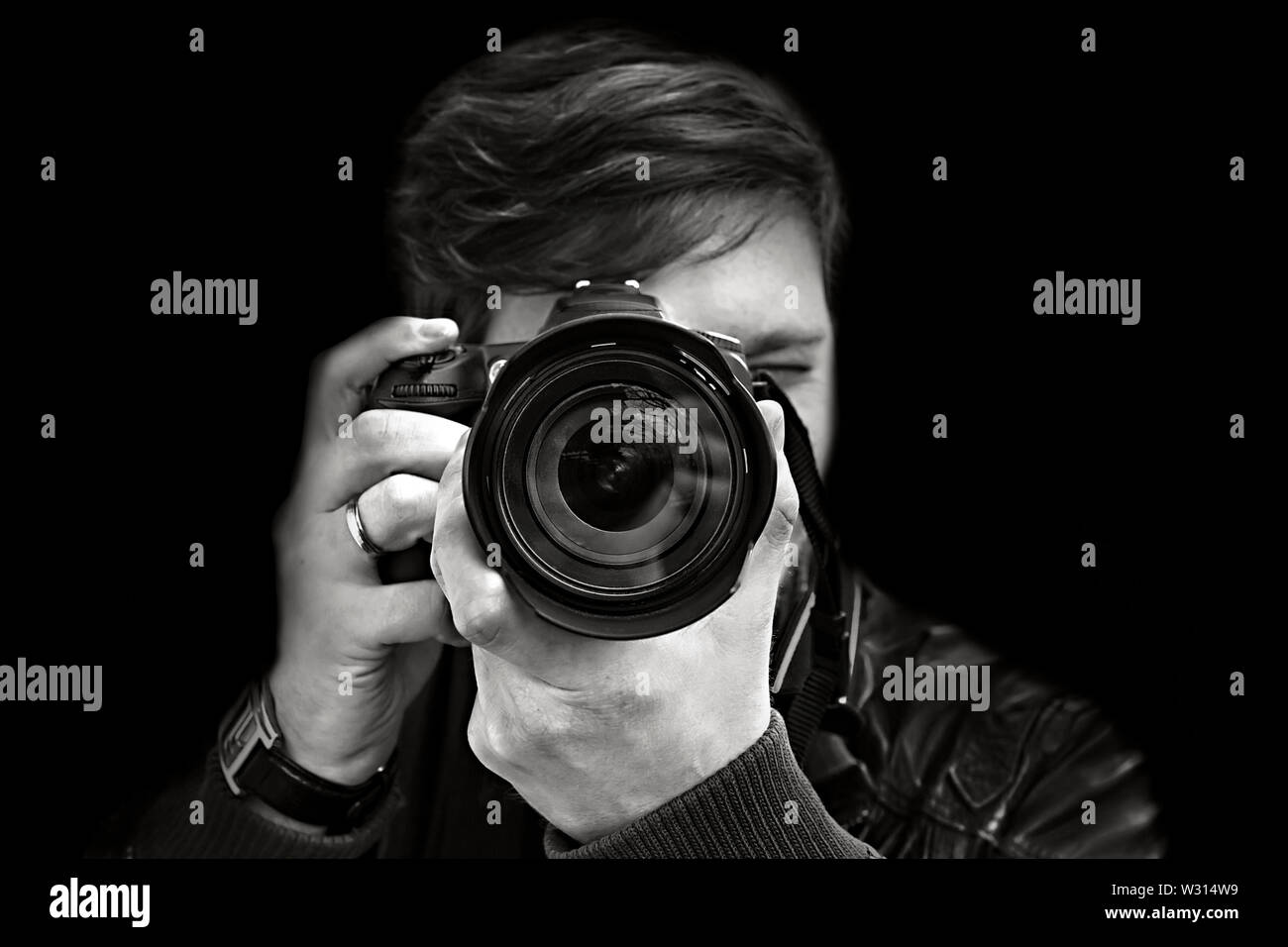 Front View Photograph photographer takes a picture. Front view, close-up Stock Photo - Alamy