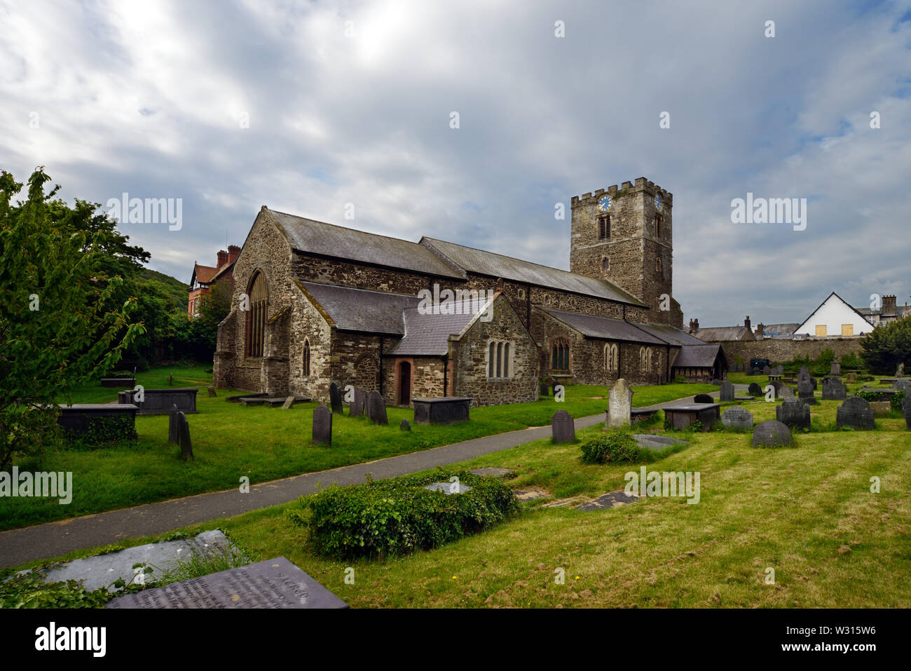 Church of St Mary's & All Saints was completed in about 1186.  It was originally a Cistercian Abbey but in 1283 King Edward I removed the Welsh monks. Stock Photo