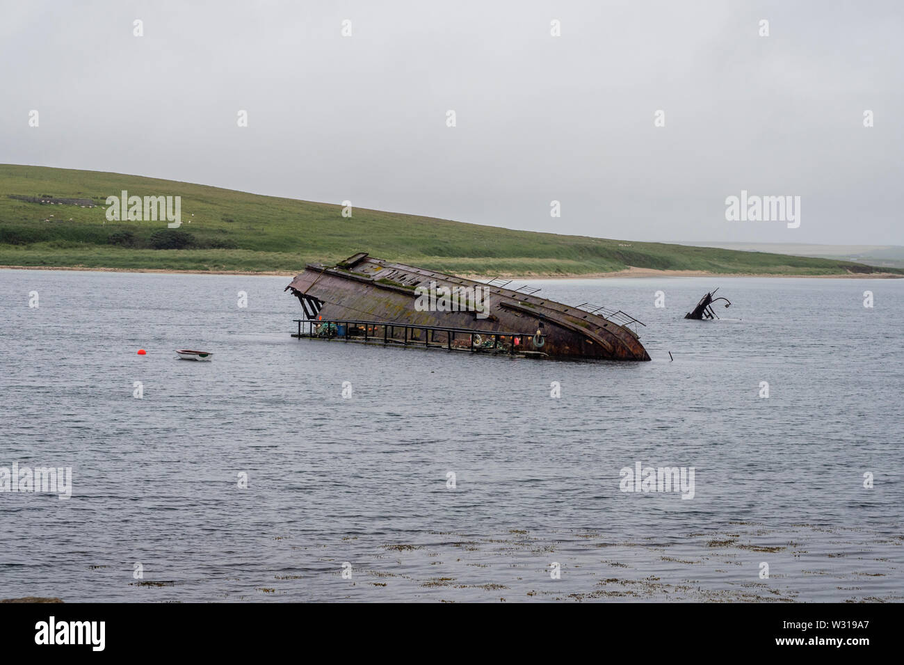 Scapa Flow is a body of water in the Orkney Islands, Scotland, sheltered by the islands of Mainland, Graemsay, Burray, South Ronaldsay and Hoy. Stock Photo