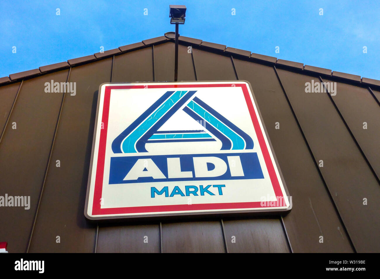 Aldi Markt logo supermarket store Berlin Germany Stock Photo