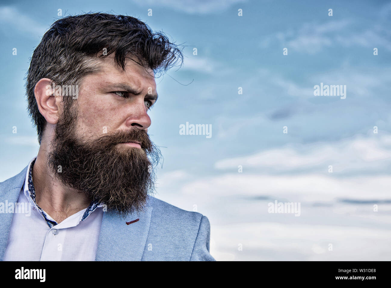 Man bearded hipster with mustache blue sky background. Ultimate mustache grooming guide. Expert