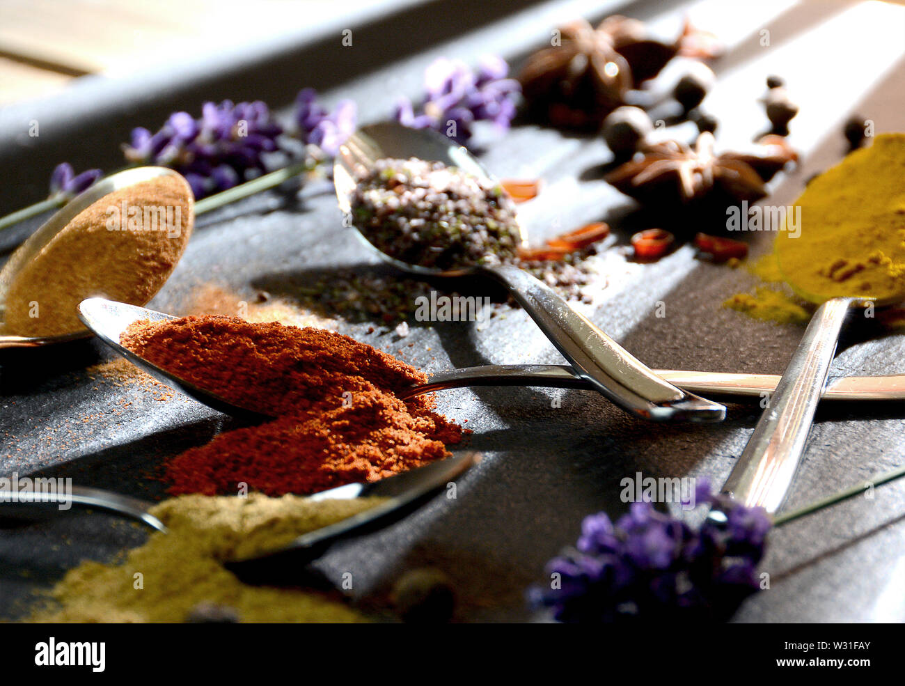 spices on spoons Stock Photo