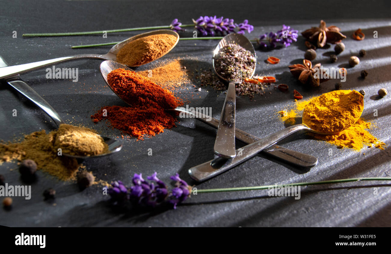 spices on spoons Stock Photo