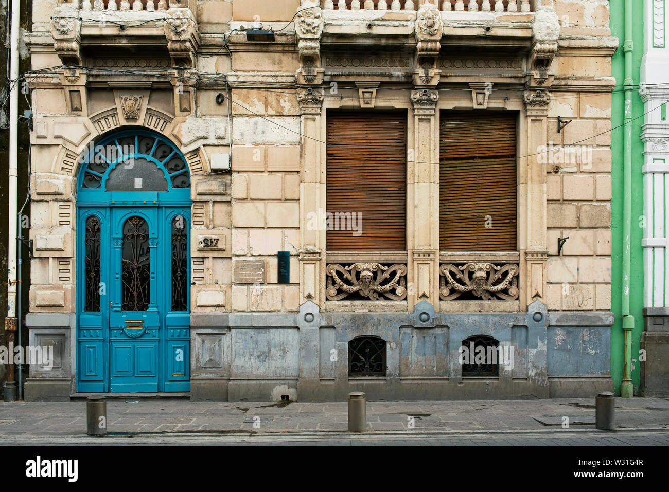 Building facade with Spanish colonial details in downtown Puebla, UNESCO World Heritage site. Puebla de Zaragoza, Mexico. Jun 2019 Stock Photo