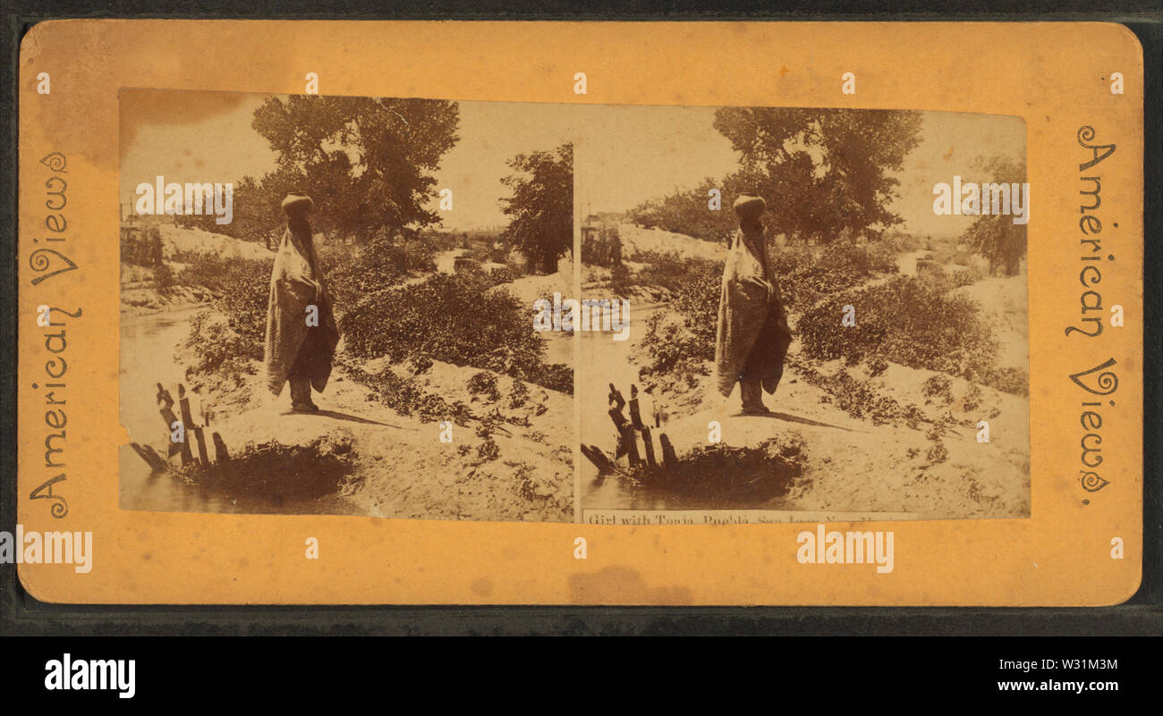 Pueblo woman balancing a pot on her head, from Robert N Dennis collection of stereoscopic views Stock Photo