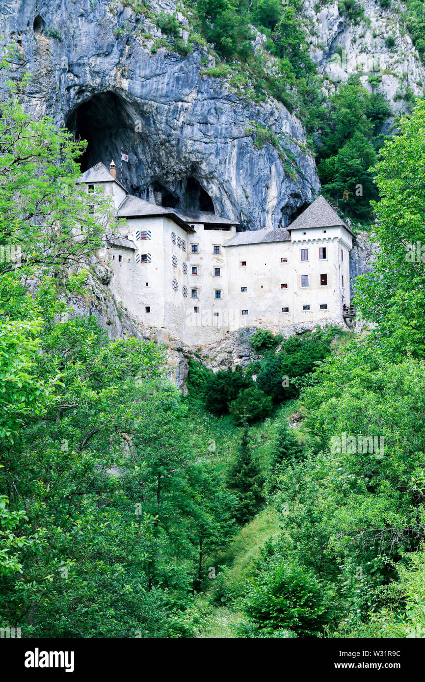 Predjama Castle, a medieval castle, built in the mouth of a cave on a cliff face near Postojna in Slovenia Stock Photo