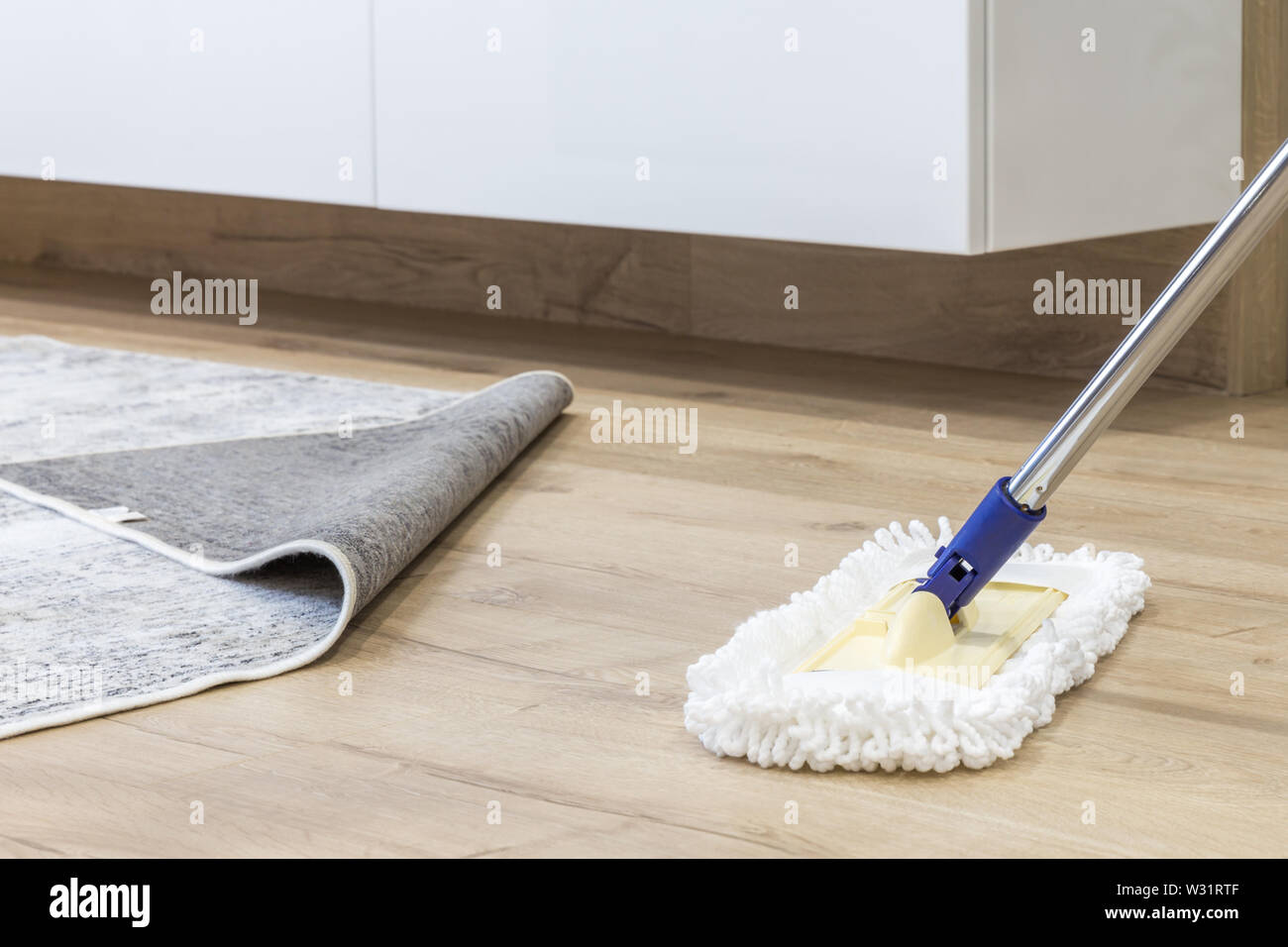 Wooden Floor With White A Mop Cleaning Service Concept Stock