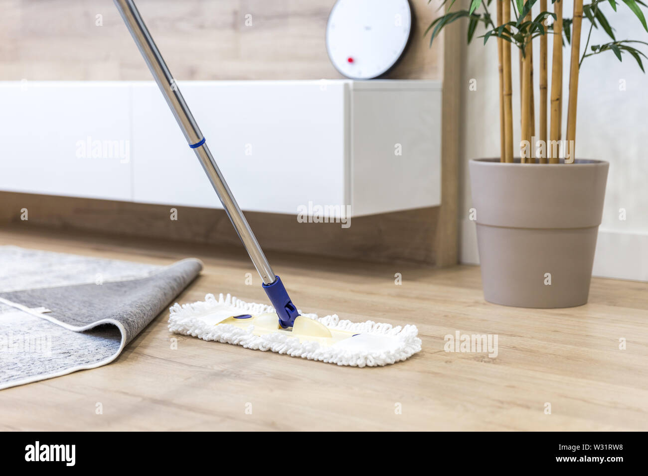 Wooden Floor With White A Mop Cleaning Service Concept Stock