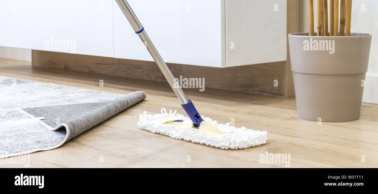 Wooden Floor With White A Mop Cleaning Service Concept Stock