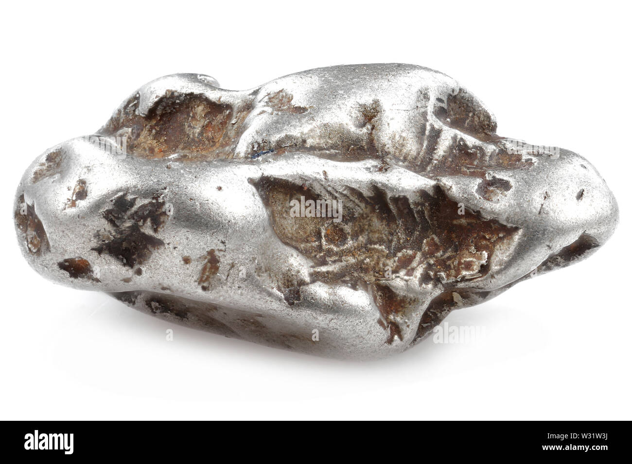 native 0.6 gram platinum nugget from the Fox Gulch, Goodnews Bay, Alaska isolated on white background Stock Photo