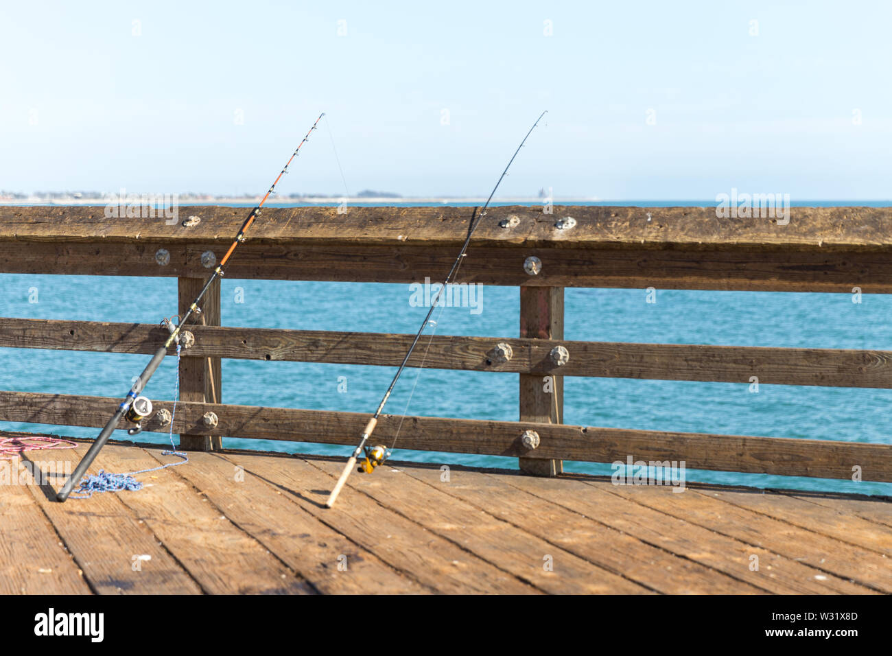 Fishing pole on pier stock image. Image of pursuit, carefree - 27225321