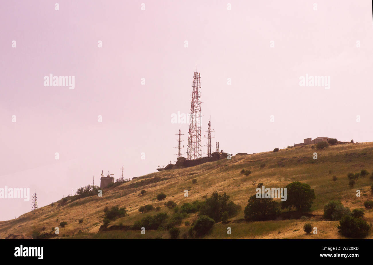 4 May 2018 An Israeli monitoring station in the Golan heights Israel taken on a dull overcast day. Radio masts, aerials and satellite dishes can be se Stock Photo