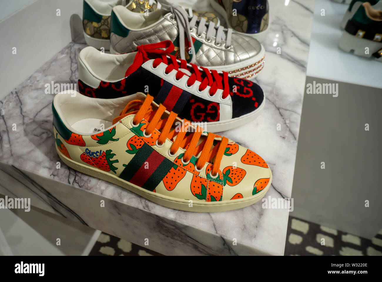 Gucci brand footwear in the luxury goods retailer Neiman Marcus department store in the Hudson Yards mall on the West Side of Manhattan on Sunday, July 7, 2019.   (© Richard B. Levine) Stock Photo